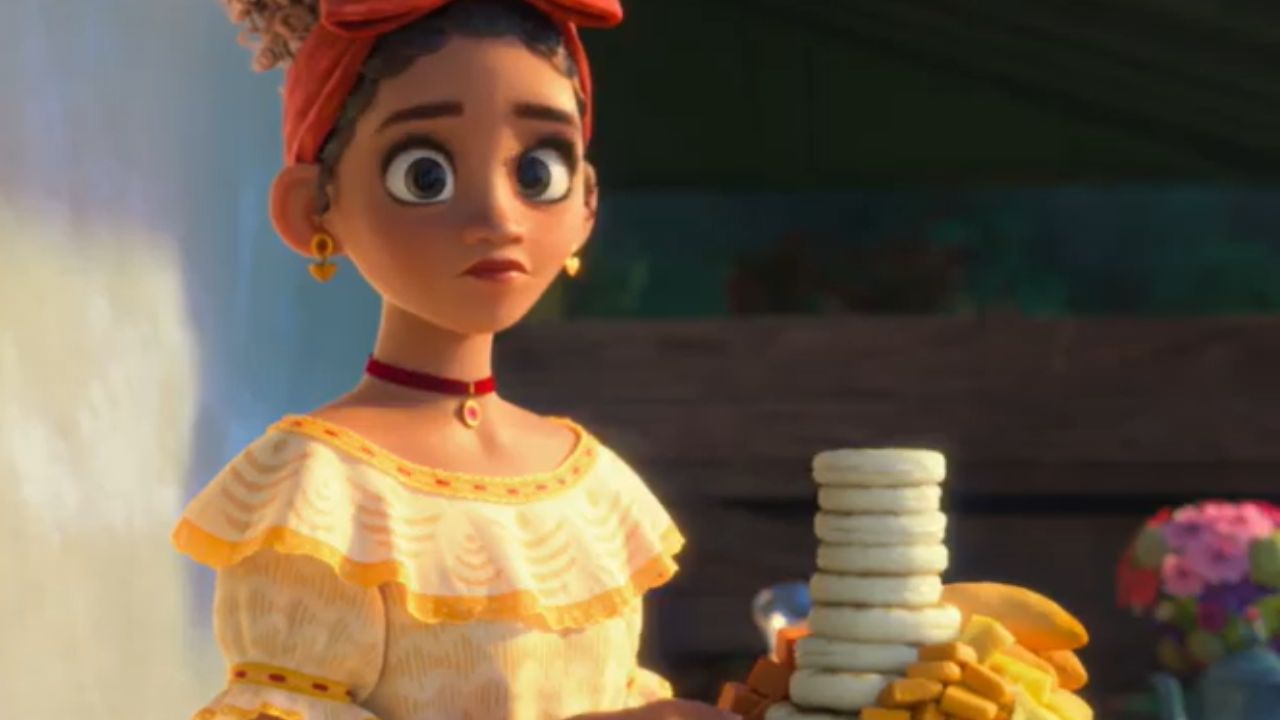 Cena do filme "Encanto" (2021) com arepas de queijo, ótima opção para o Dia das Crianças